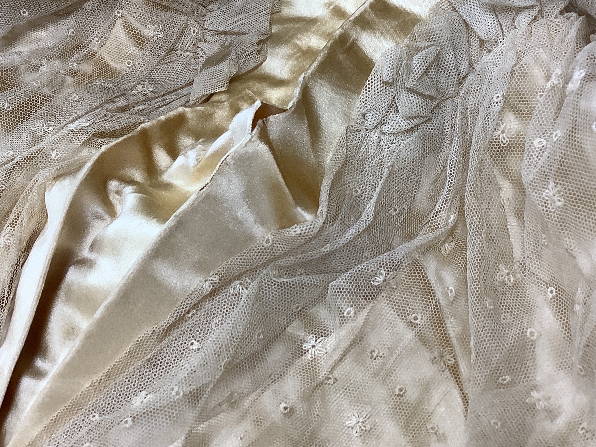 A Firth and Russell cream satin and lace wedding dress